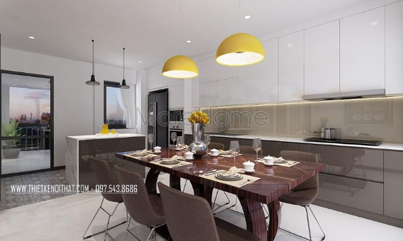 Bộ bàn ghế phòng ăn gỗ nguyên tấm sẫm 6 ghế màu kết hợp cùng tone sáng từ tủ bếp tạo nên vẻ đẹp hài hòa, sang trọng cho phòng bếp hiện đại. Thiết kế nhà bếp tiện nghi sang trọng